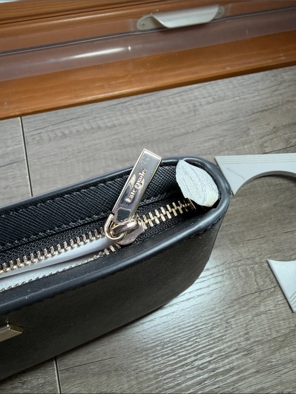 kate spade black patent saffiano wristlet clutch with gold plaque